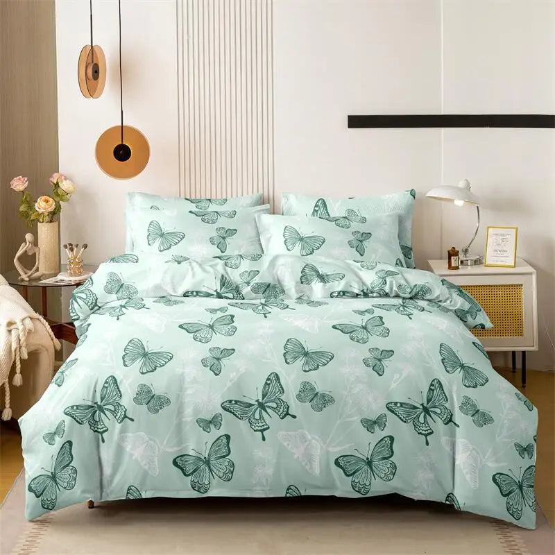 Sage-green butterfly-print duvet cover set with matching pillowcases in a styled bedroom.