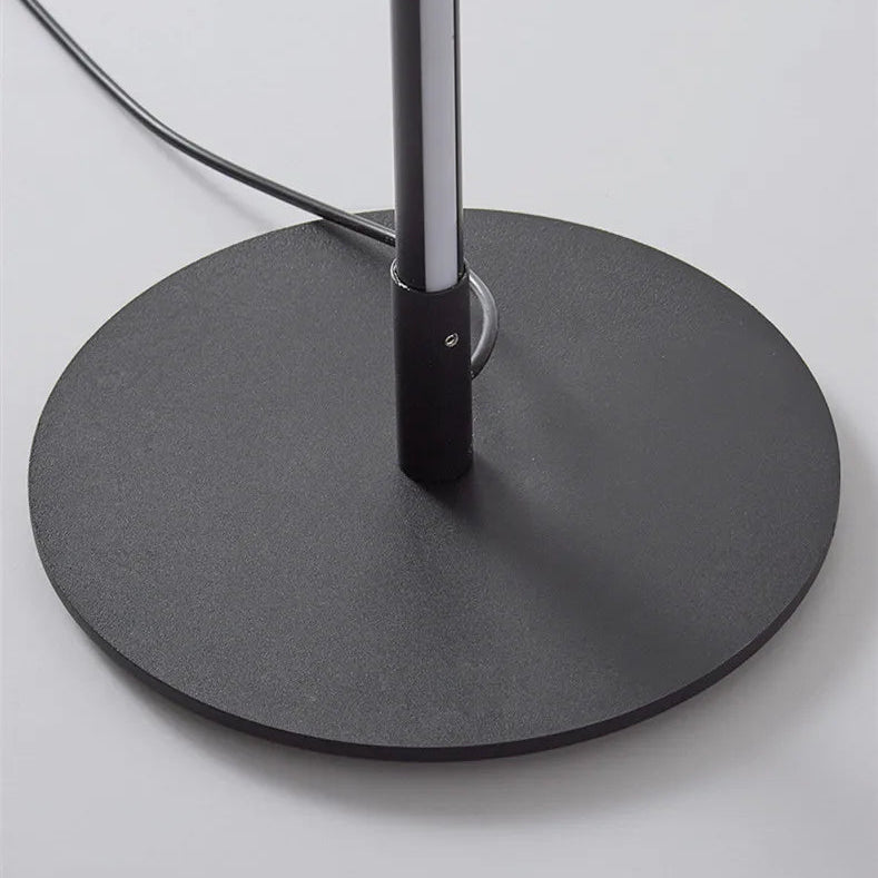 Metal floor base with a textured surface on a light grey background