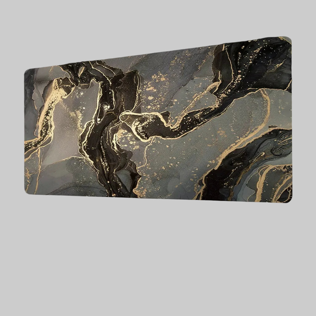 Marble-patterned mousepad with gold and black design on a grey background
