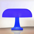 Blue table lamp with dimensions indicated on a white background