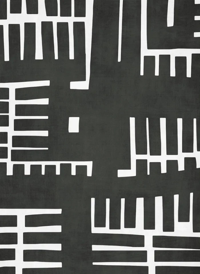 Black and white geometric pattern on a textured surface