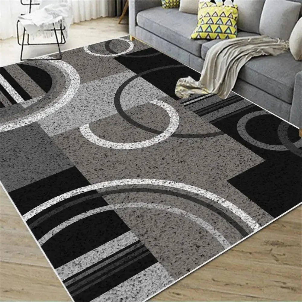 Charcoal, grey, black, and white Nordic geometric rug with abstract curved lines.