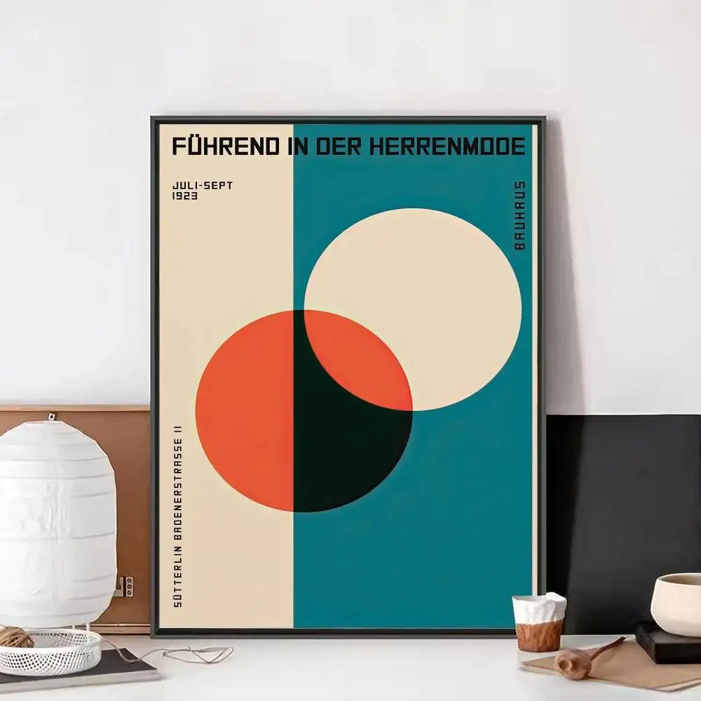 Bauhaus abstract cotton canvas print with overlapping orange, black, and cream circles on a teal and beige background.