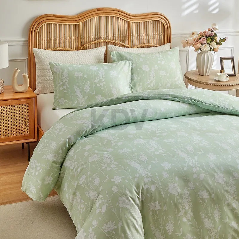 Sage green duvet cover set with delicate white meadow floral print and matching pillowcases