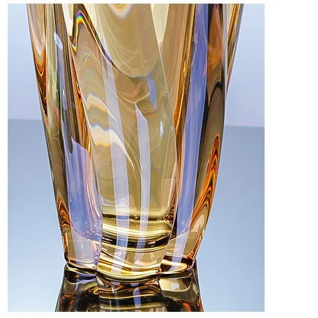 Sunset amber crystal glass vase featuring a rich golden gradient and spiralled texture.