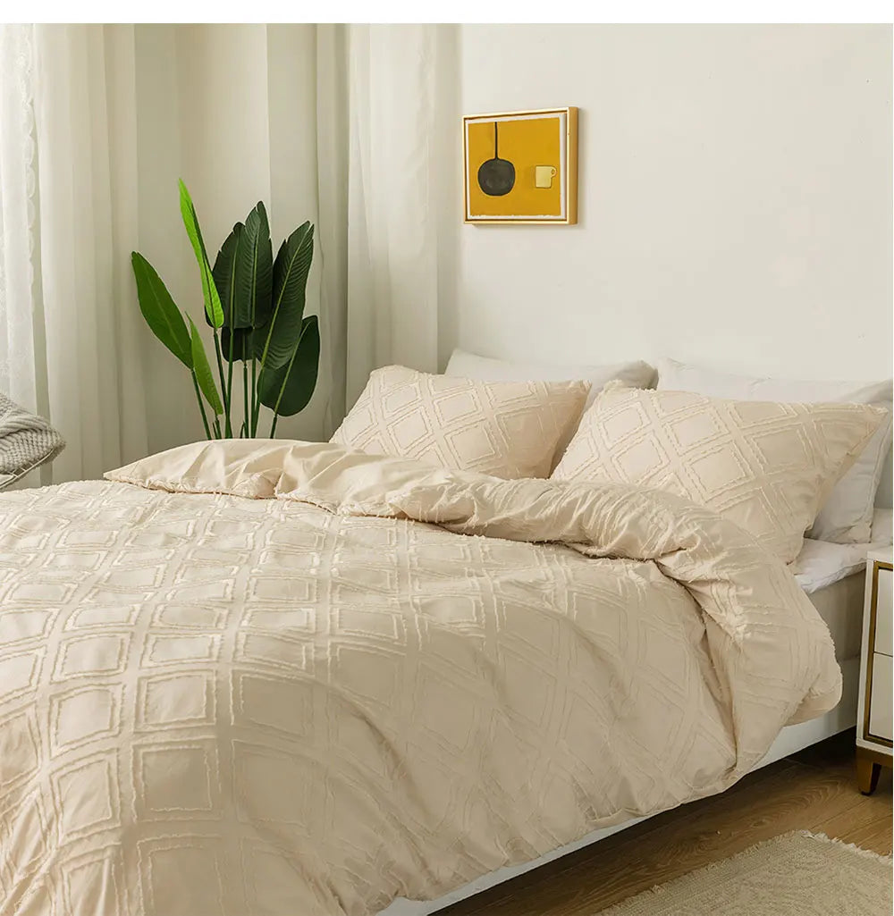 Cream textured geometric bedding set with matching pillowcases styled on a minimalist bed