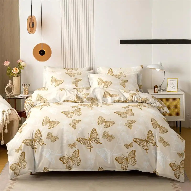 Cream butterfly-print duvet cover set with matching pillowcases in a soft, neutral bedroom.