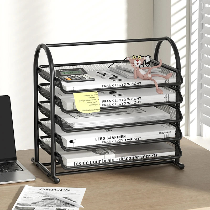 Black 5-tier metal desktop document tray with papers and books on a desk.