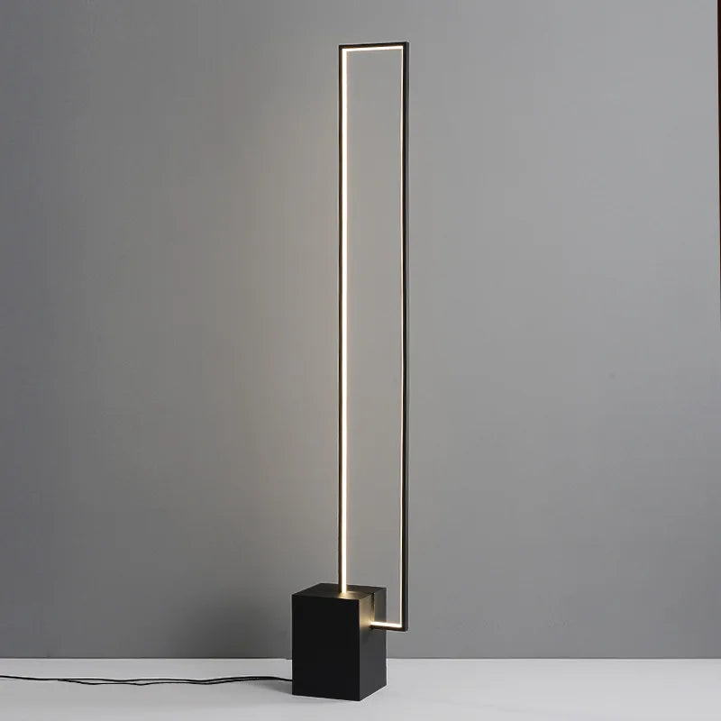 Rectangle Frame 130cm — Modern rectangular frame LED floor lamp with glowing outline and black block base, 130cm high.