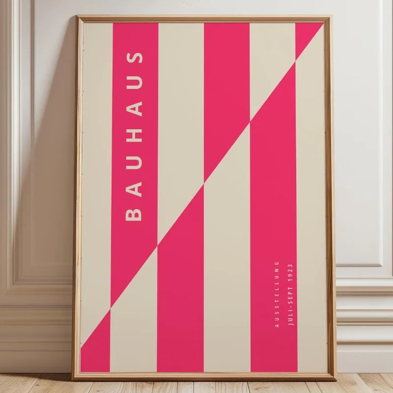 Bauhaus striped wall art with bright pink vertical bands and diagonal stripe composition on a neutral background