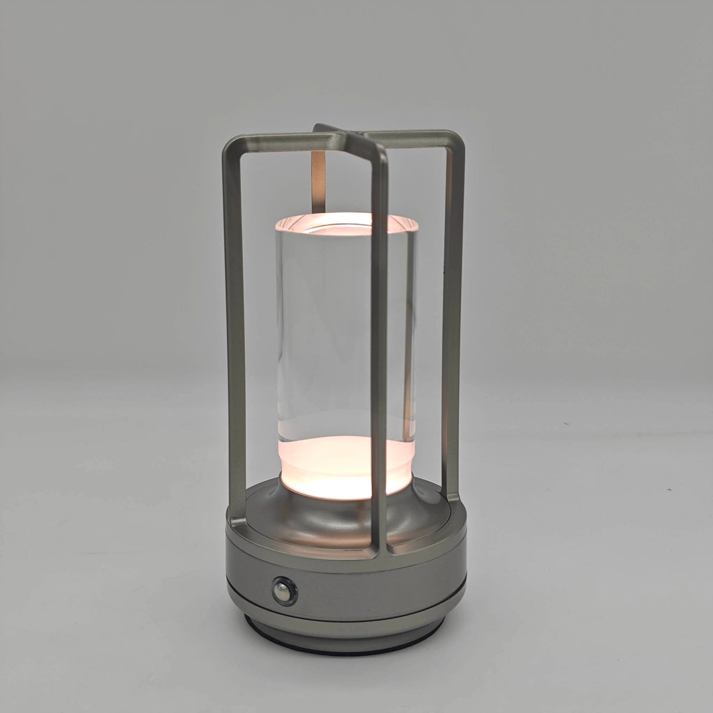 Cylindrical lamp with glass cover on a grey background