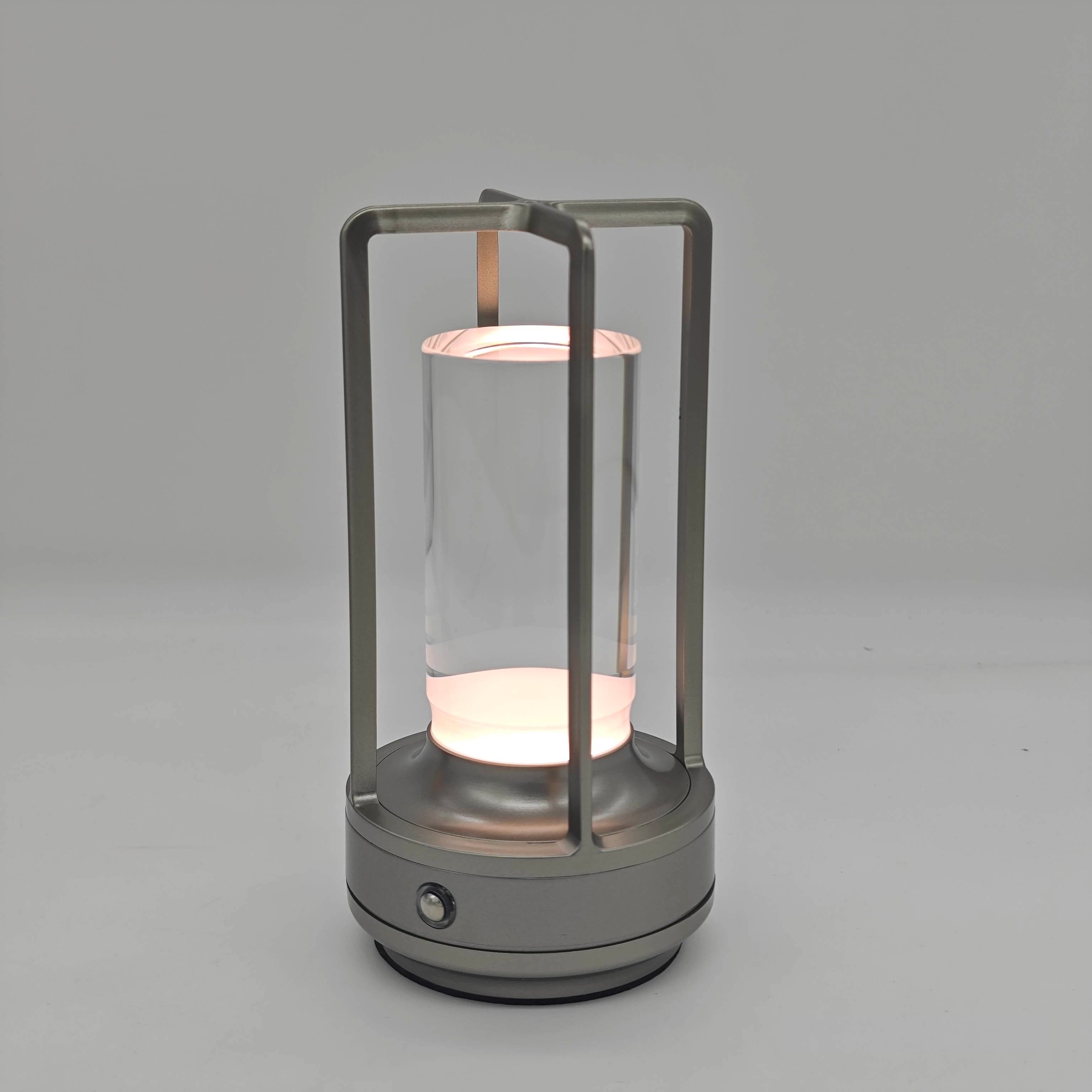Cylindrical lamp with glass cover on a grey background