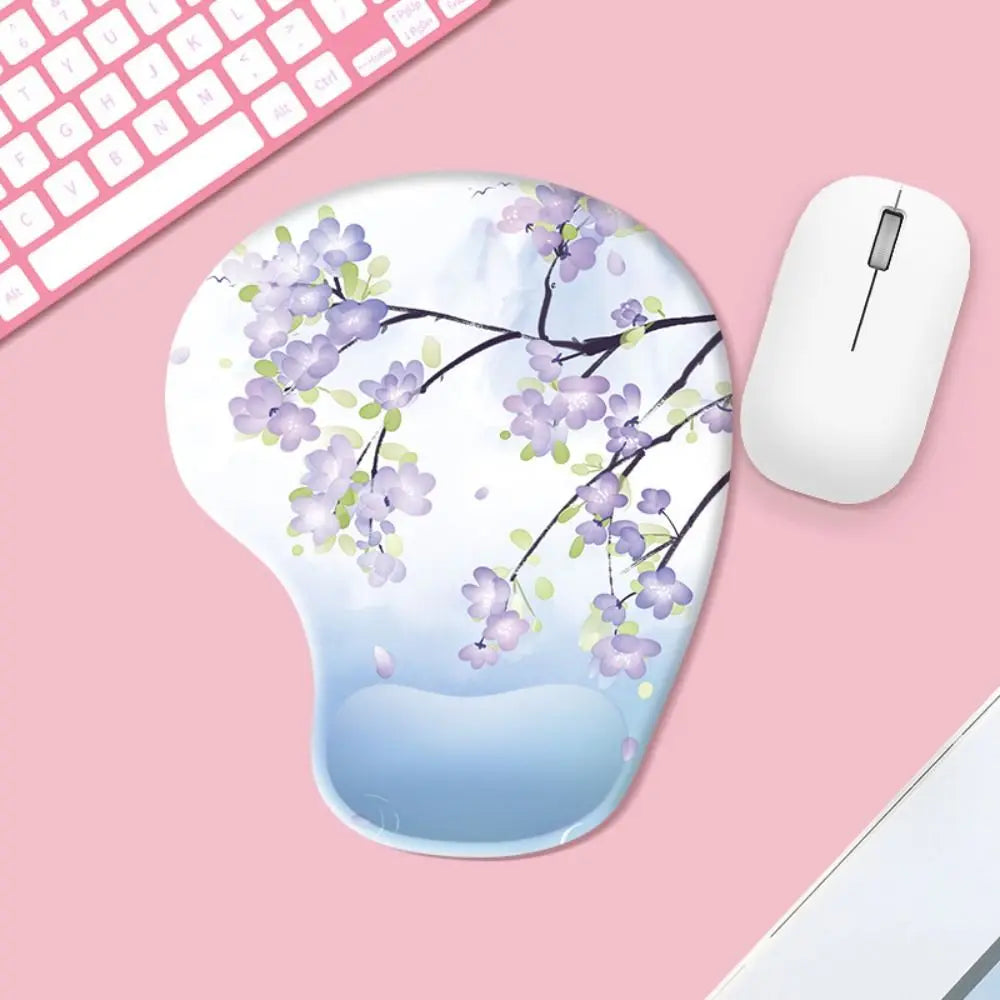 Mouse pad with floral design on a pink surface