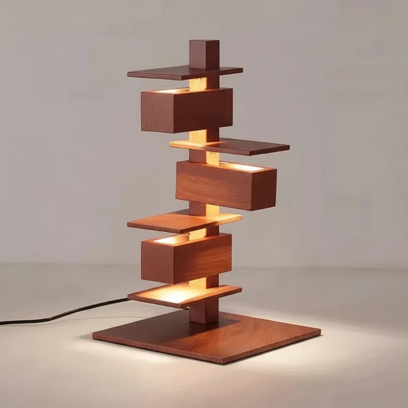 Rosewood grain geometric table lamp with stacked metal design, 46cm height and 25cm base