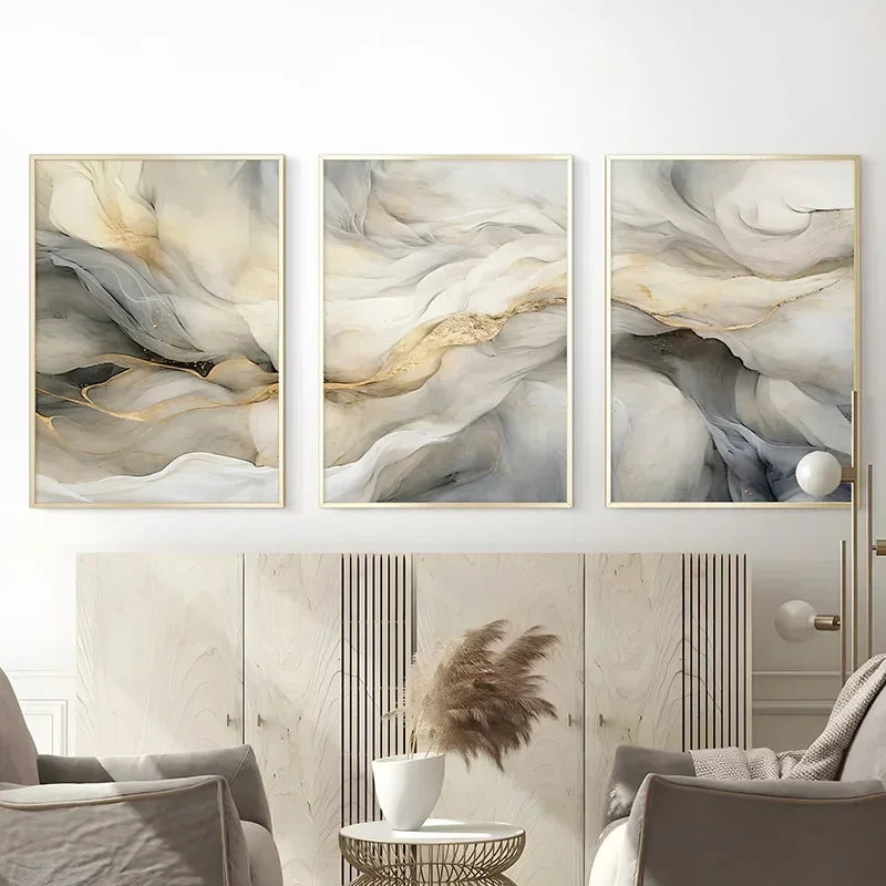 Fluid marble-style art with sweeping grey tones and delicate gold-toned highlights.