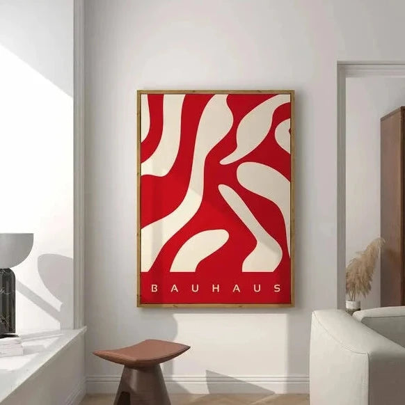 Bauhaus red abstract print with cream cutout shapes on a vivid red background