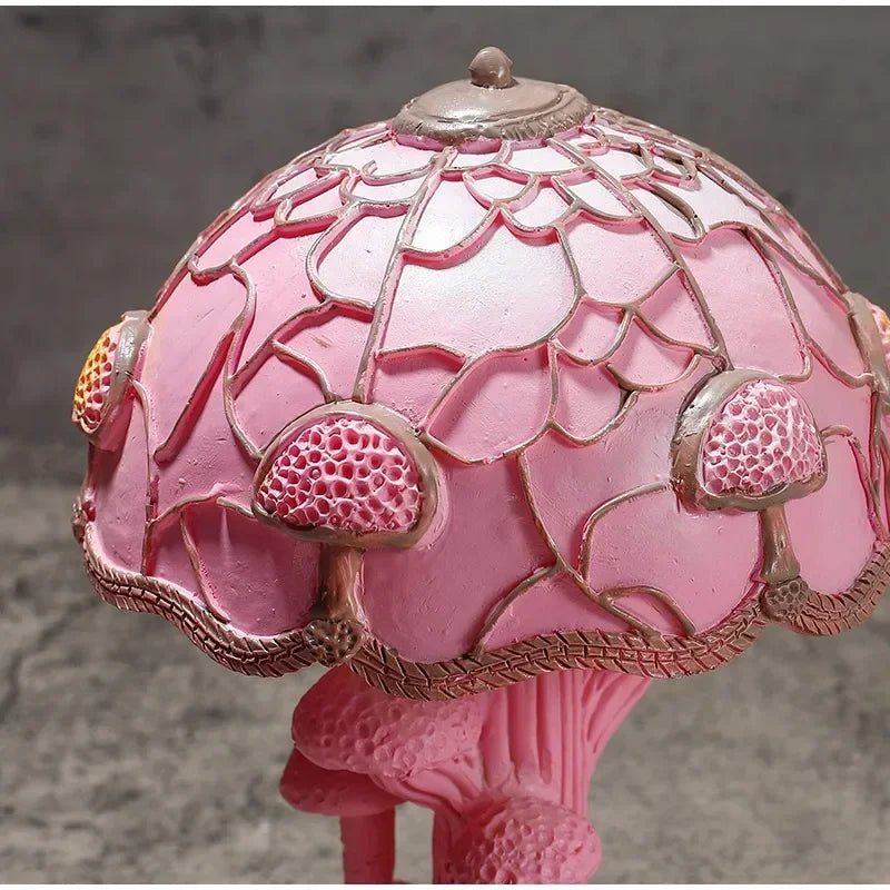 Pink-stained resin mushroom lamp with forest-style sculpted base