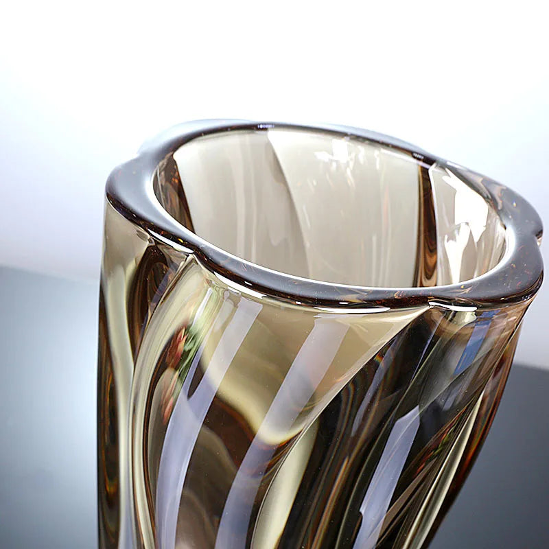 Sunset amber crystal glass vase featuring a rich golden gradient and spiralled texture.