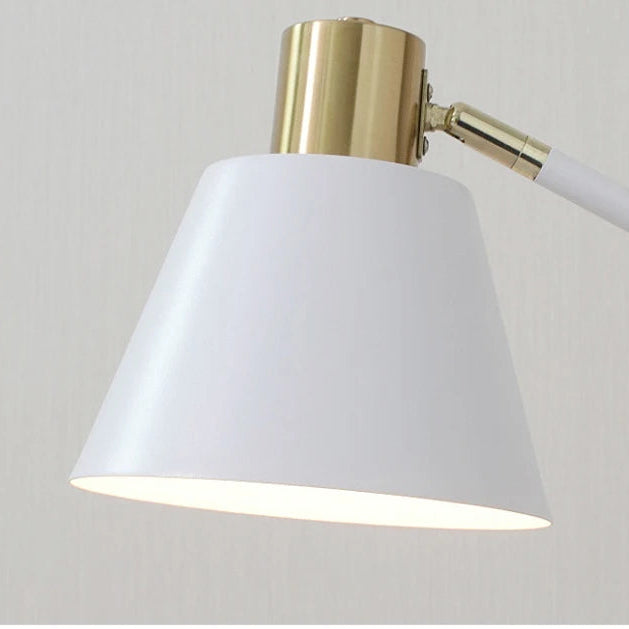 White Metal Lampshade Detail — Close-up of the white metal lampshade with gold-tone fitting and smooth treated surface.
