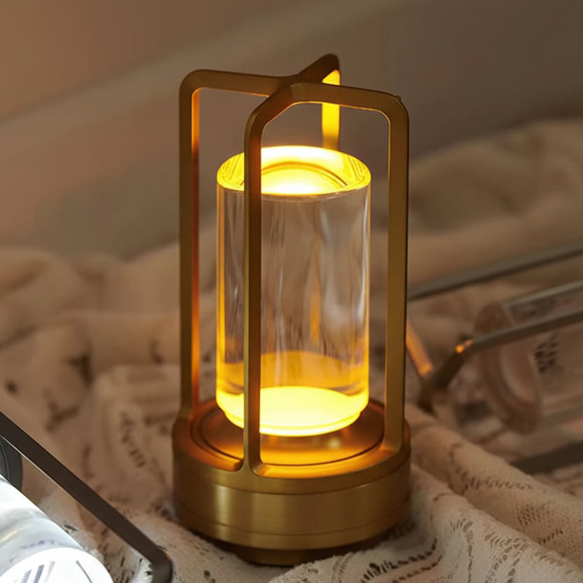 Decorative lamp with warm glow on a textured surface.