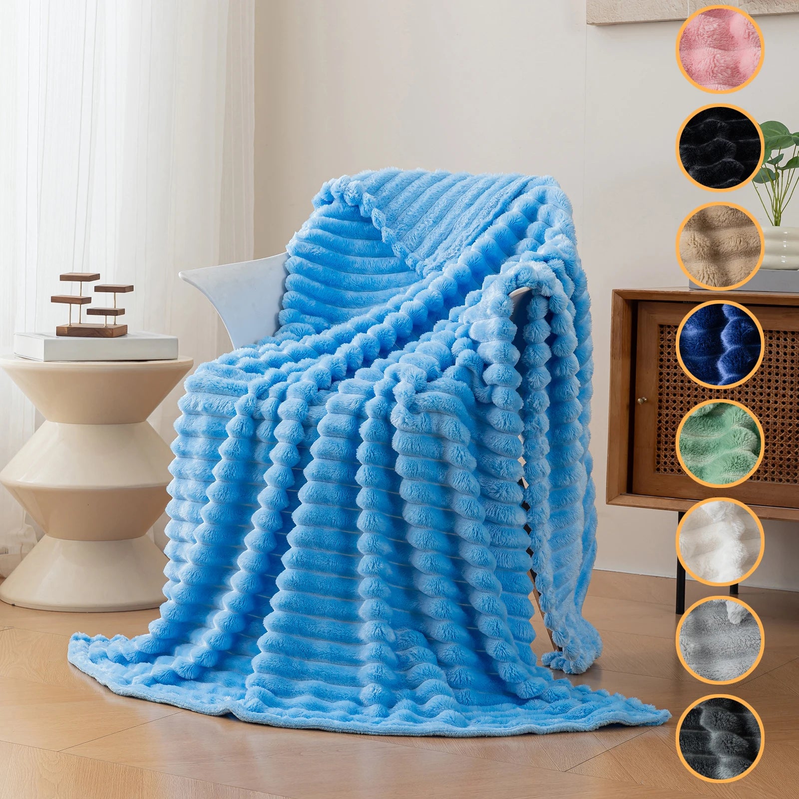 Sky blue flannel blanket with a soft, fluffy finish styled across a bed