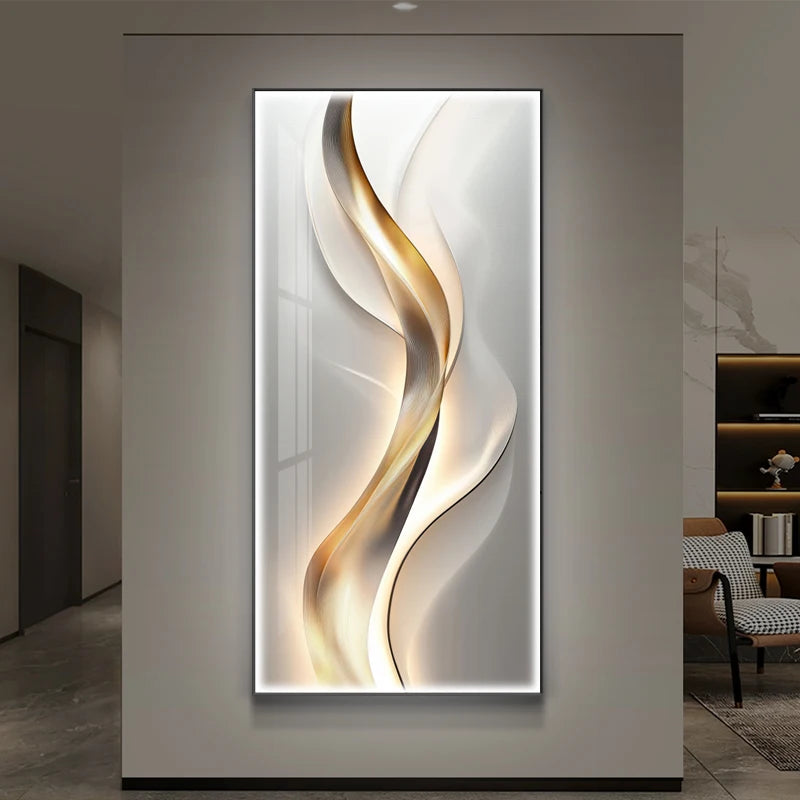 Bold gold ribbon abstract LED wall art panel with warm backlighting in a contemporary living space