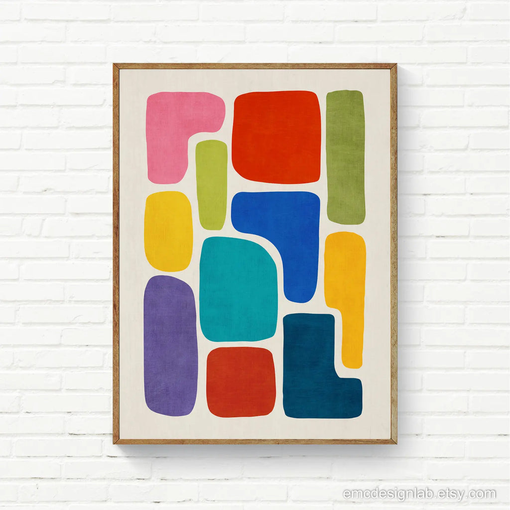 Colorful abstract art print on a white brick wall