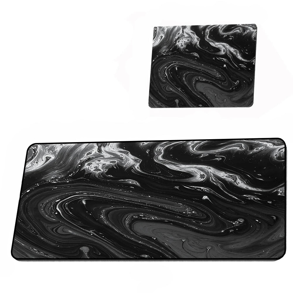 Two black and white marbled mouse pads on a white background