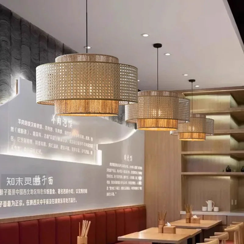 Modern restaurant interior with pendant lights and a wall with text