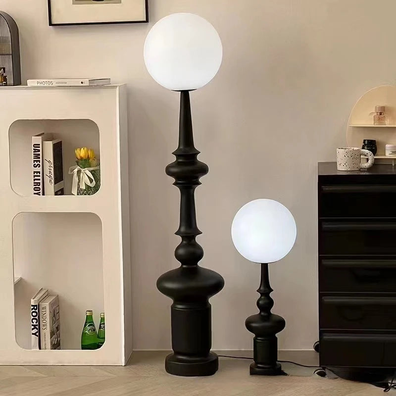 Black globe floor lamp and table lamp with totem base, frosted shade, D30cm x H136cm, E27 LED, D25cm x H68cm.