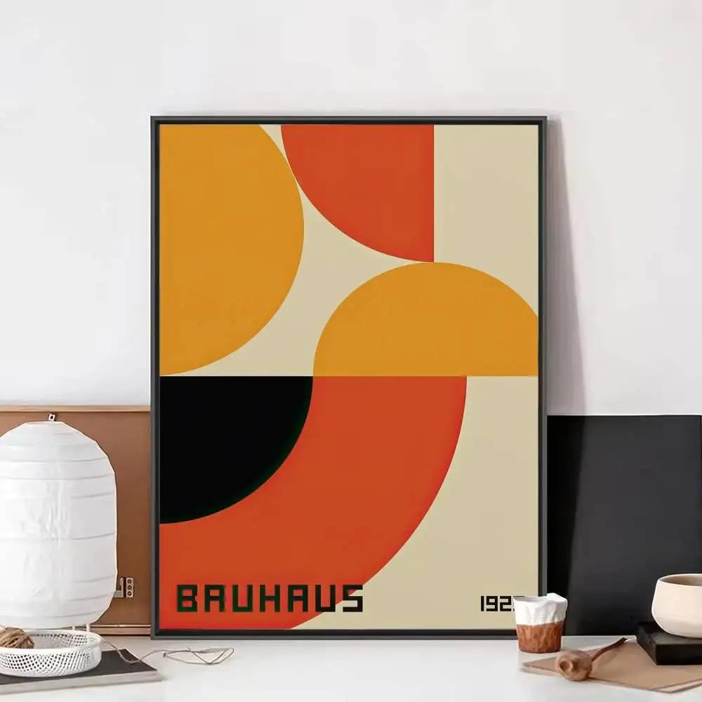 Bauhaus geometric canvas print with curved orange, yellow, cream, and black shapes in a bold abstract layout.