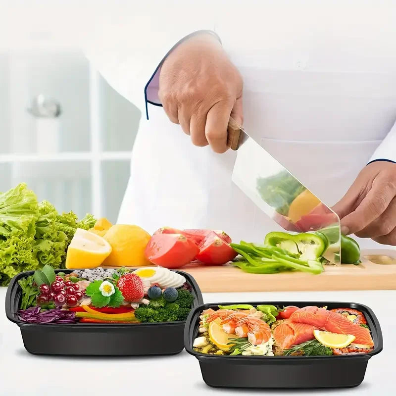 Person preparing food with a knife, surrounded by vegetables and fruits on a kitchen counter.
