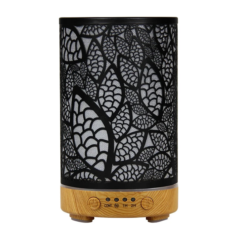 100ml black leaf pattern diffuser with light wood grain base on a white background.