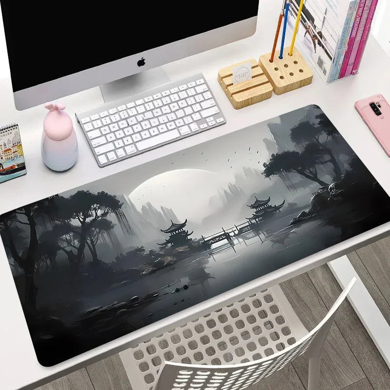 Large mouse pad with dark grey misty pagoda and river landscape, shown flat and rolled