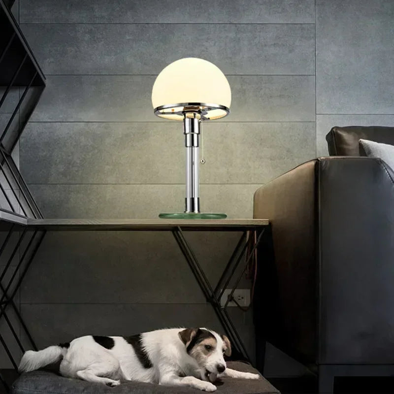 Lit mushroom table lamp with a warm ambient glow on the shelf