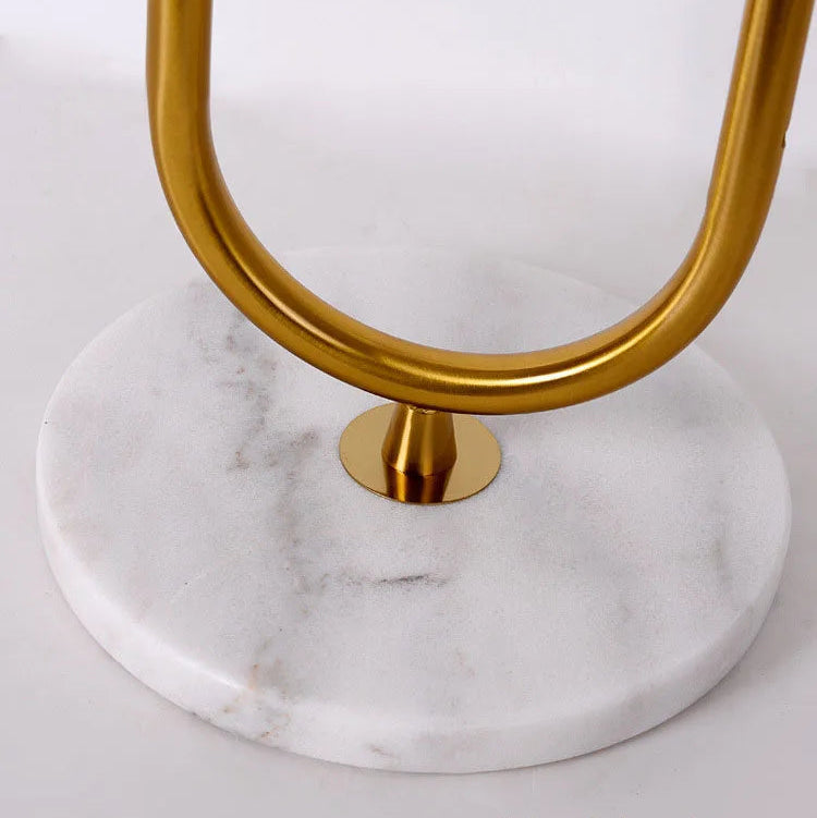 Close-up of a round wedge marble base