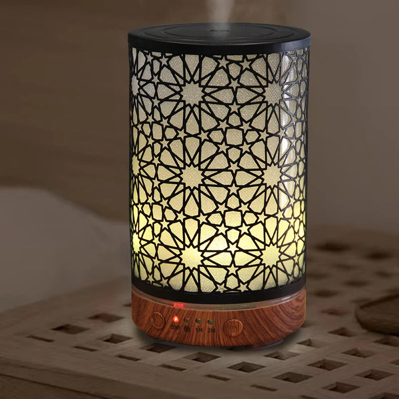 Decorative diffuser with geometric pattern on a wooden surface