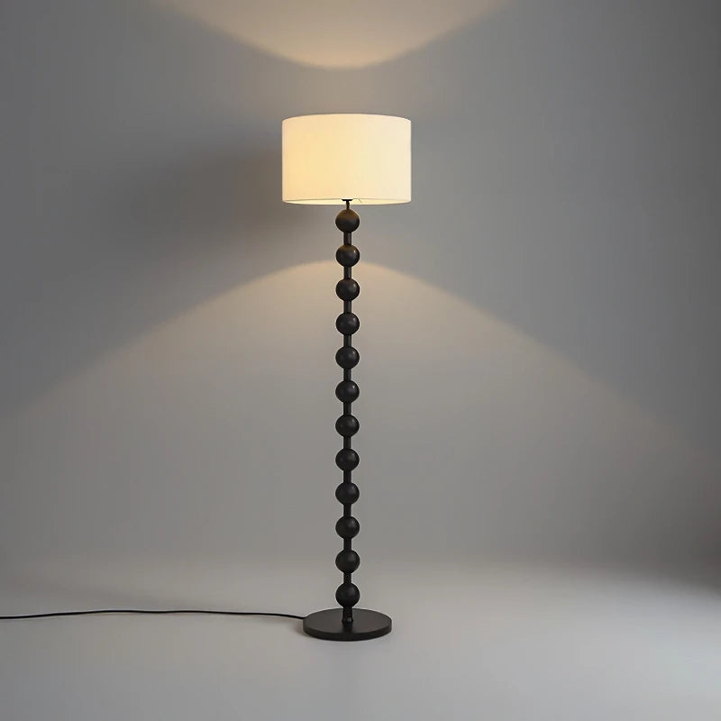 Midnight black edition of the sphere floor lamp with a 155cm height and a 35cm wide fabric shade.