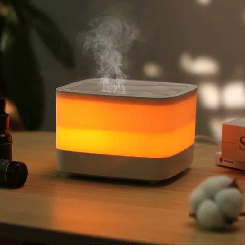Warm-lit USB humidifier with nano mist rising from the top