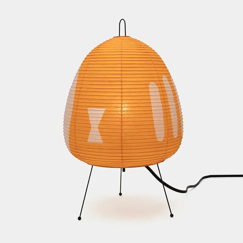 Orange lamp with a textured shade on a white background