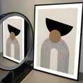 Contemporary geometric print with black arch lines and clay-toned circle on beige background