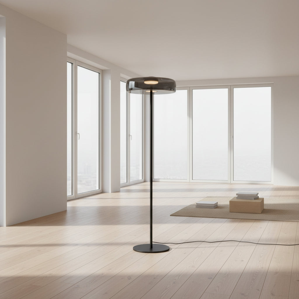 A smoked grey glass floor lamp with a chrome base showing 145cm height and 42cm width dimensions.