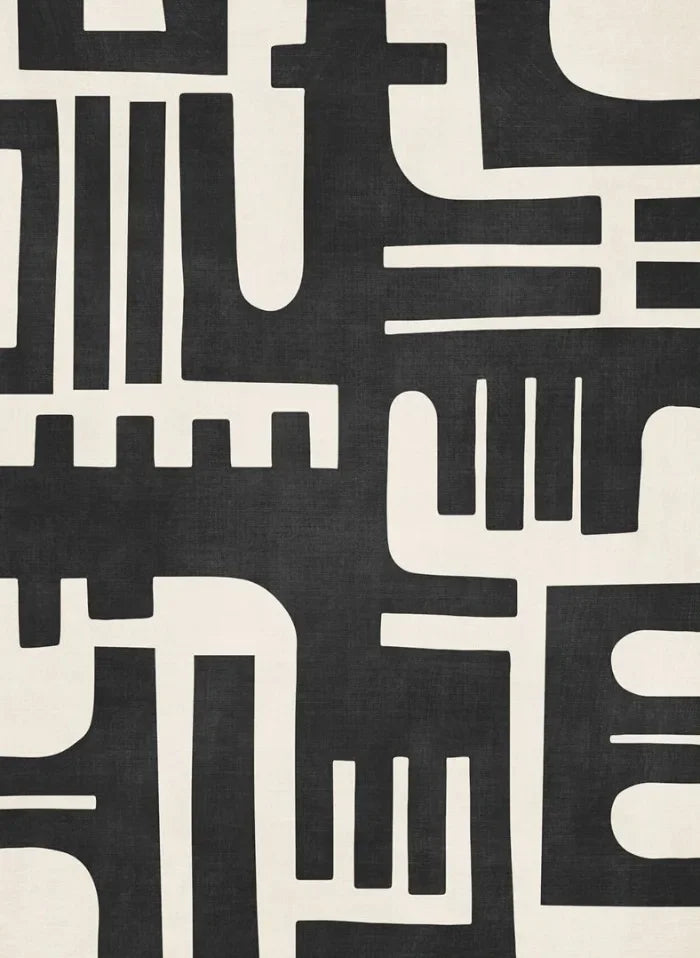 Black and white geometric pattern on a textured surface