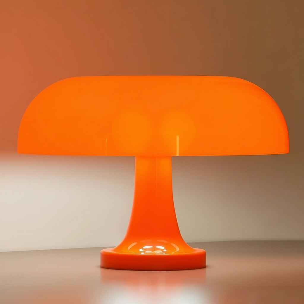 Orange table lamp with dimensions indicated on a plain background