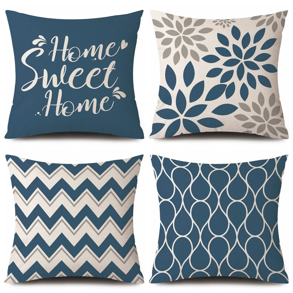 Four decorative cushion covers with different patterns on a white background