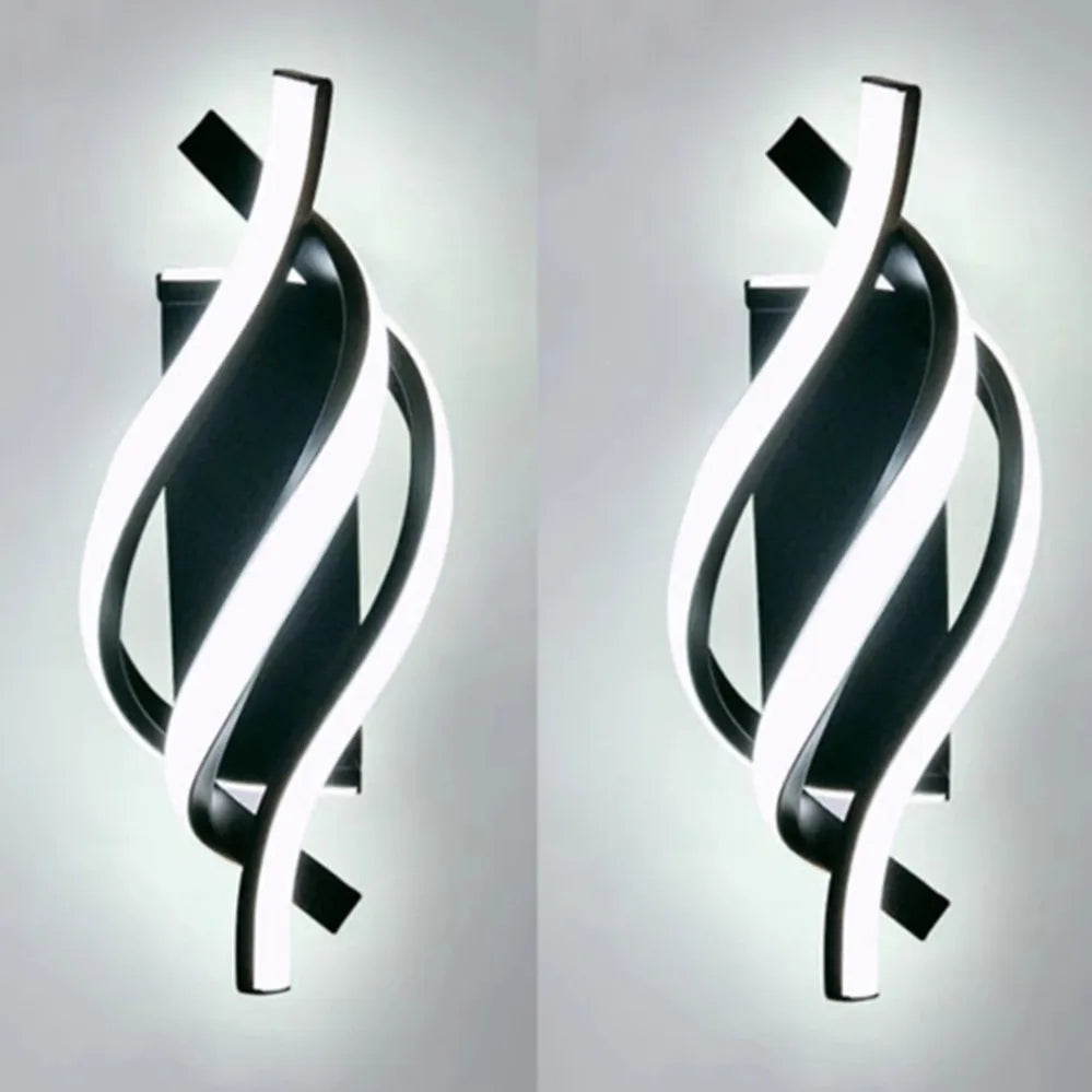 Modern wall sconces with a black and white design on a grey background