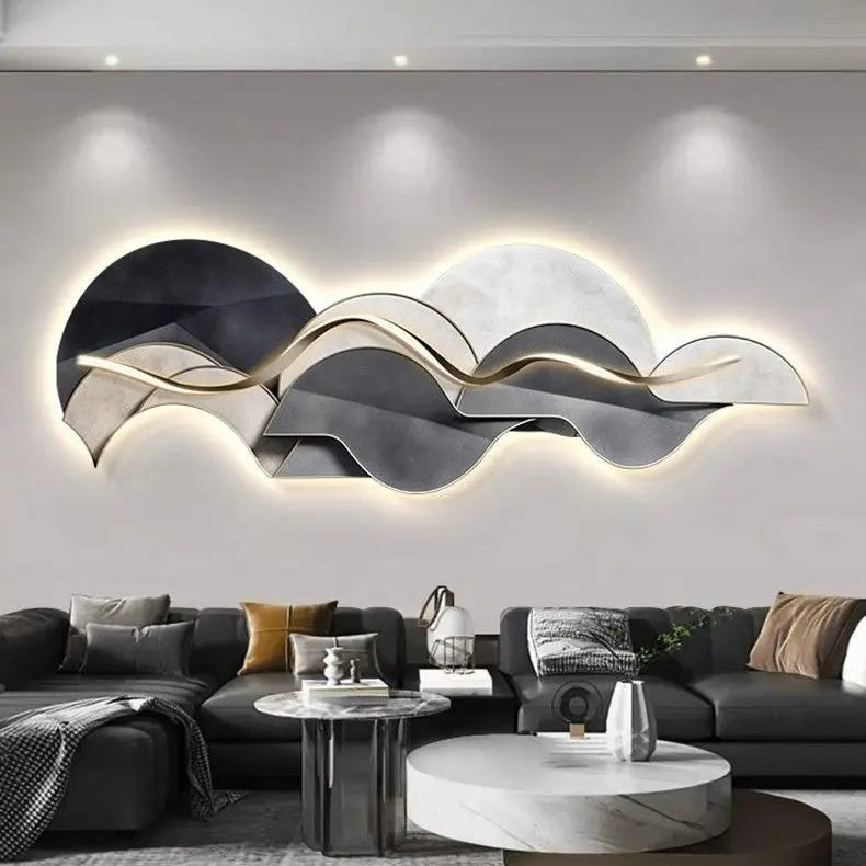 Large sculptural LED wall light with warm backlit glow and wave-inspired abstract design