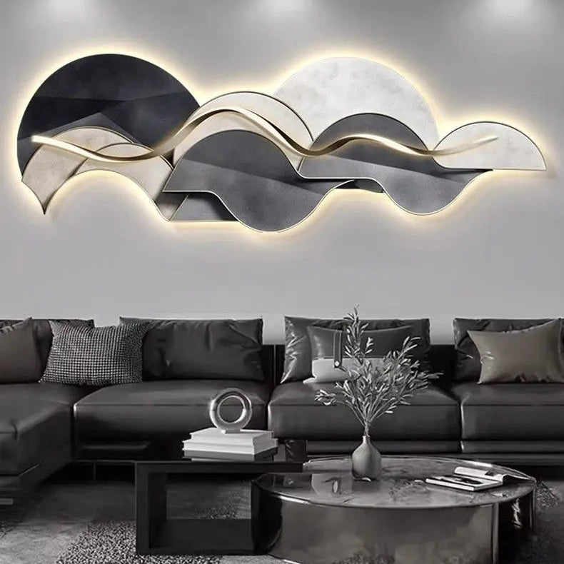 Large sculptural LED wall light with warm backlit glow and wave-inspired abstract design
