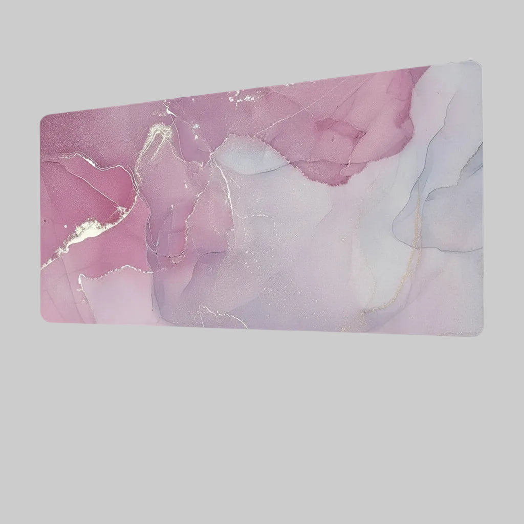 Mousepad with pink and purple abstract design on a grey background.