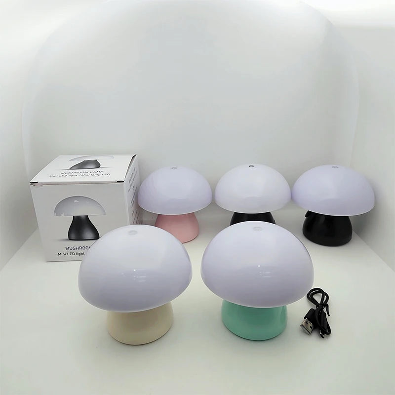 Set of mushroom-shaped lamps with a white box in the background